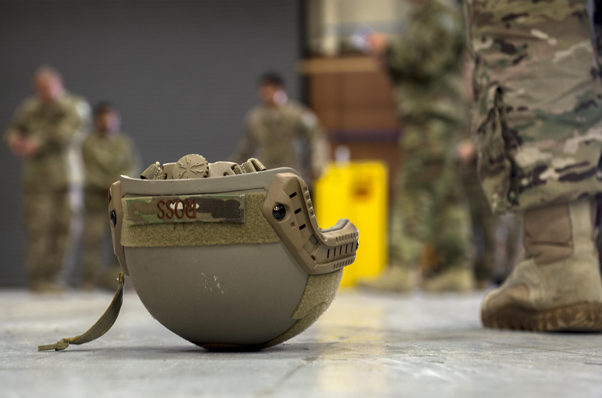 A helmet rests while members of the 93d Air Ground Operations Wing practice different jump mechanics, June 16, 2015 at Moody Air Force Base, Ga. Members of the 93d AGOW practice different ways to exit the aircraft, proper use of their gear, and different ways to move their body as they near the ground. (U.S. Air Force photo by Tech. Sgt. Zachary Wolf/Released)