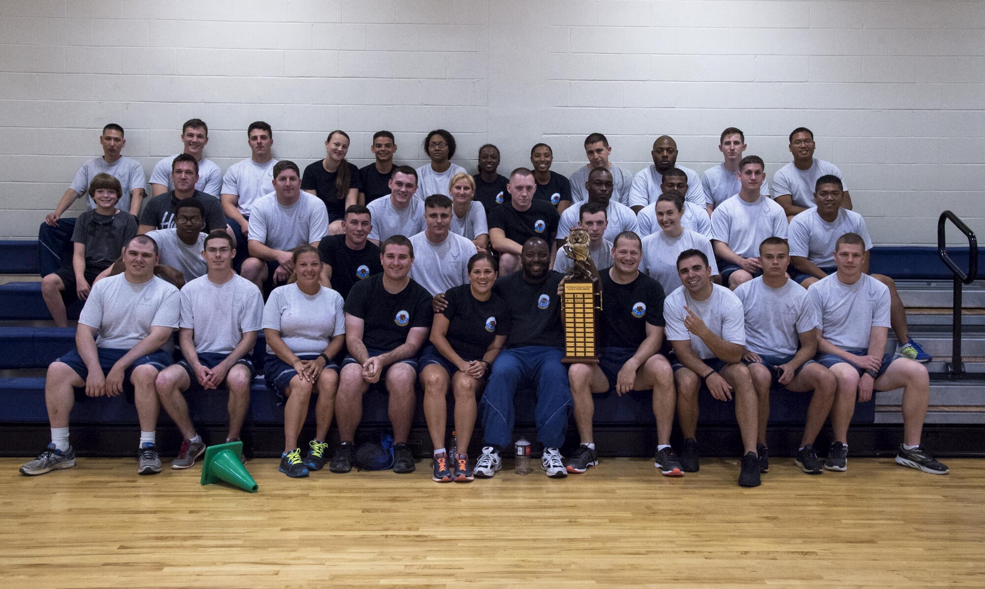 U.S. Air Force Airmen from the 23d Communications Squadron pose for a photo during Sports Day, June 17, 2016, at Moody Air Force Base, Ga. This is the sixth year the 23d Mission Support Group hosted a sports day and the second year that the 23d CS has won. (U.S. Air Force photo by Airman 1st Class Janiqua P. Robinson/Released)