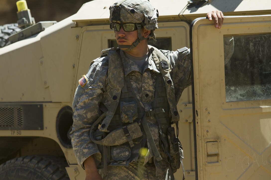 Spc. Hector Gonzalez, U.S. Army Reserve military police Soldier from the 341st Military Police Company, of Hollister, California, stands and waits for further directions during the Combat Support Training Exercise (CSTX) on 18 June at Fort Hunter-Liggett, California. 54 units from across the U.S. Army Reserve, National Guard, Active Army, U.S. Air Force, U.S. Navy, and Canadian Army participate in the 84th Training Command's second Combat Support Training Exercise (CSTX) of the year, CSTX 91-16-02, hosted by the 91st Training Division. (Photos by Spc. Victoria Friend)