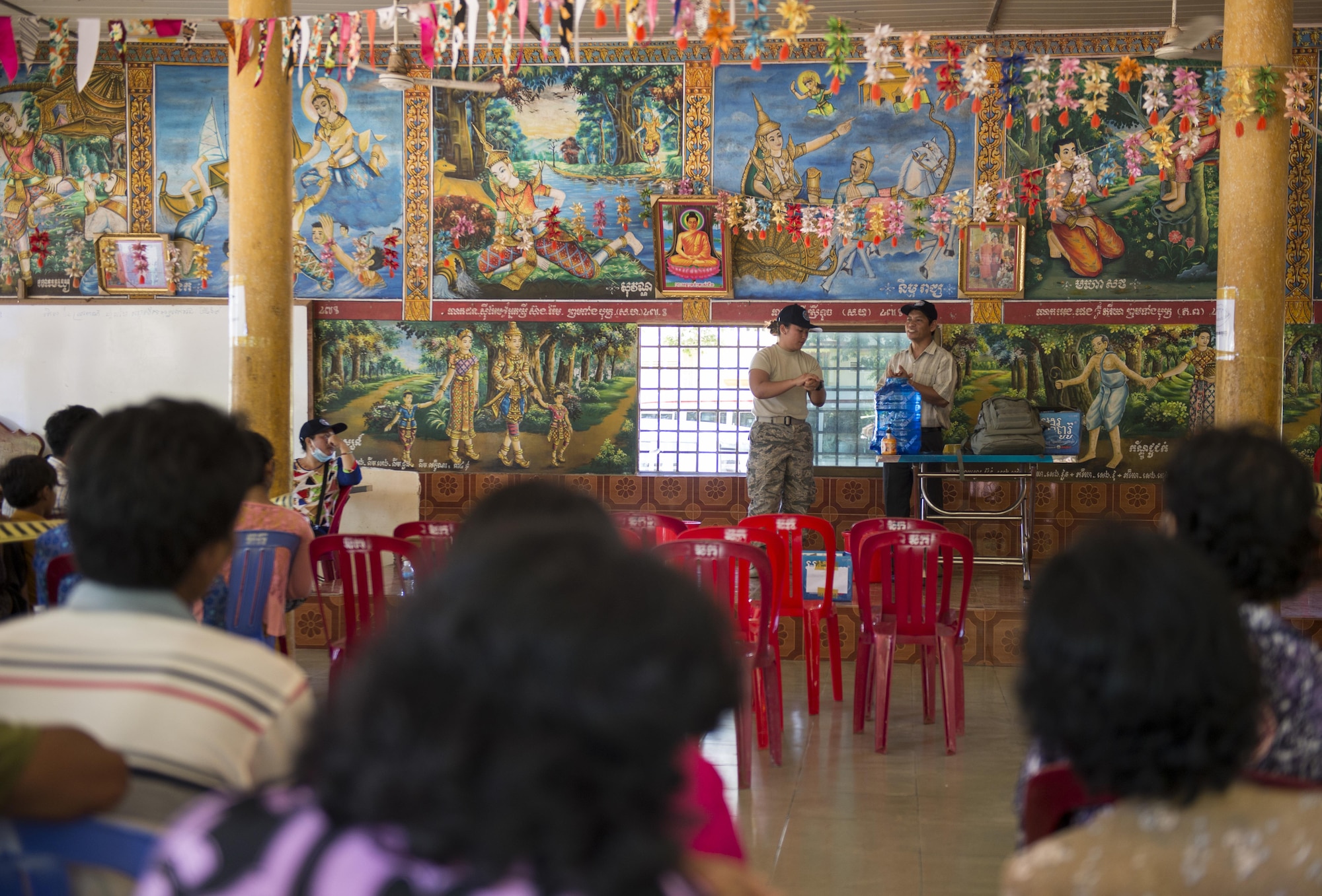 U.S. Air Force Staff Sgt. Necita Aldan, Kadena Air Base’s 18th Wing Medical Group public health technician, shows patients proper handwashing techniques during Pacific Angel 16-2 June 13, 2016, in Kampot Province, Cambodia. As a public health technician, Aldan taught patients basic hygiene and also tallied numbers for patients seen during the humanitarian operation. More than 1,500 patients were seen through the first three days of Pacific Angel 16-2. The mission enhances participating nations’ humanitarian assistance and disaster relief capabilities while providing needed services to people in need throughout the Indo-Asia-Pacific region.  (U.S. Air Force photo by Senior Airman Omari Bernard/Released)