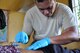 U.S Air Force Maj. Villanueva dry needles a patient in order to aid in relieving lower back-pain June 14, 2016, in Kampot Province, Cambodia. Throughout the course of the week doctors, dentists, and pharmacists from the U.S., Cambodia, Australia, Vietnam and Thai militaries and two non-governmental organizations, along with 65 volunteers from the provincial hospital and local villages, saw more than 3,400 patients at two different sites. Together they provided general health, dental, optometry, pediatrics, and physical therapy services. (U.S. Air Force photo by Capt. Susan Harrington/Released)