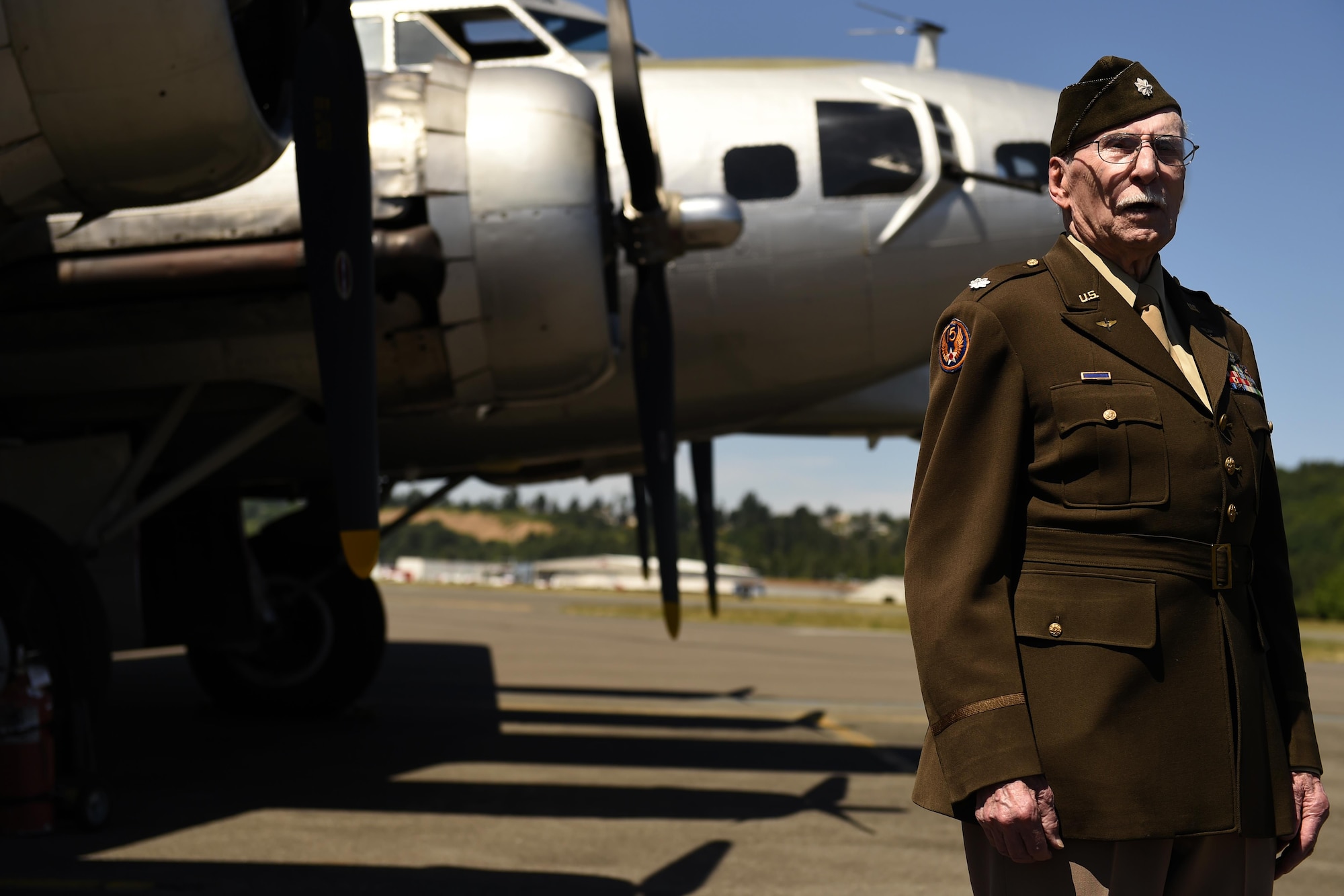 Retired Lt. Col. Ken Wheeler, World War II B-17 navigator, stands in front a B-17 Flying Fortress at the Museum of Flight in Seattle, Wash., June 6, 2016. Wheeler was part of a media day at the Museum of Flight for the arrival of the B-17. (U.S Air Force photo/ Tech. Sgt. Tim Chacon)