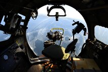 The nose turret of a B-17 Flying Fortress flying over Seattle, Wash., June 6, 2016. The navigator and bombardier were both located in the nose turret. (U.S Air Force photo/ Tech. Sgt. Tim Chacon)  