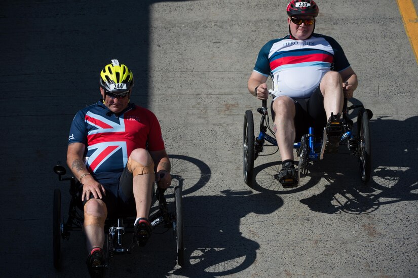 British Army veteran Lance Cpl. David Shaw, left, races a recumbent cycle during the 2016 Department of Defense Warrior Games at the U.S. Military Academy in West Point, N.Y. June 19, 2016. DoD photo by EJ Hersom