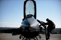 U.S. Air Force Col. Brian Toth, the 354th Operations Group commander, climbs an F-16 Fighting Falcon before a morning sortie, June 16, 2016, during RED FLAG-Alaska 16-2, at Eielson Air Force Base, Alaska. Toth took command in July 2015, making this his third assignment at Eielson. (U.S. Air Force photo by Staff Sgt. Ashley Nicole Taylor/Released)
