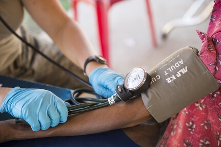 U.S. Air Force Tech. Sgt. Nichole Olive, Idaho Air National Guard’s 124th Medical Group technician, checks the blood pressure of a patient during Pacific Angel 16-2, June 13, 2016, in Kampot Province, Cambodia. The Idaho National Guard has partnered with Cambodia’s Armed Forces to train together through the Air National Guard’s State Partnership Program. The SPP pairs up National Guard units with countries throughout the world as a way to build and foster greater ongoing relationships. (U.S. Air Force photo by Senior Airman Omari Bernard/Released)