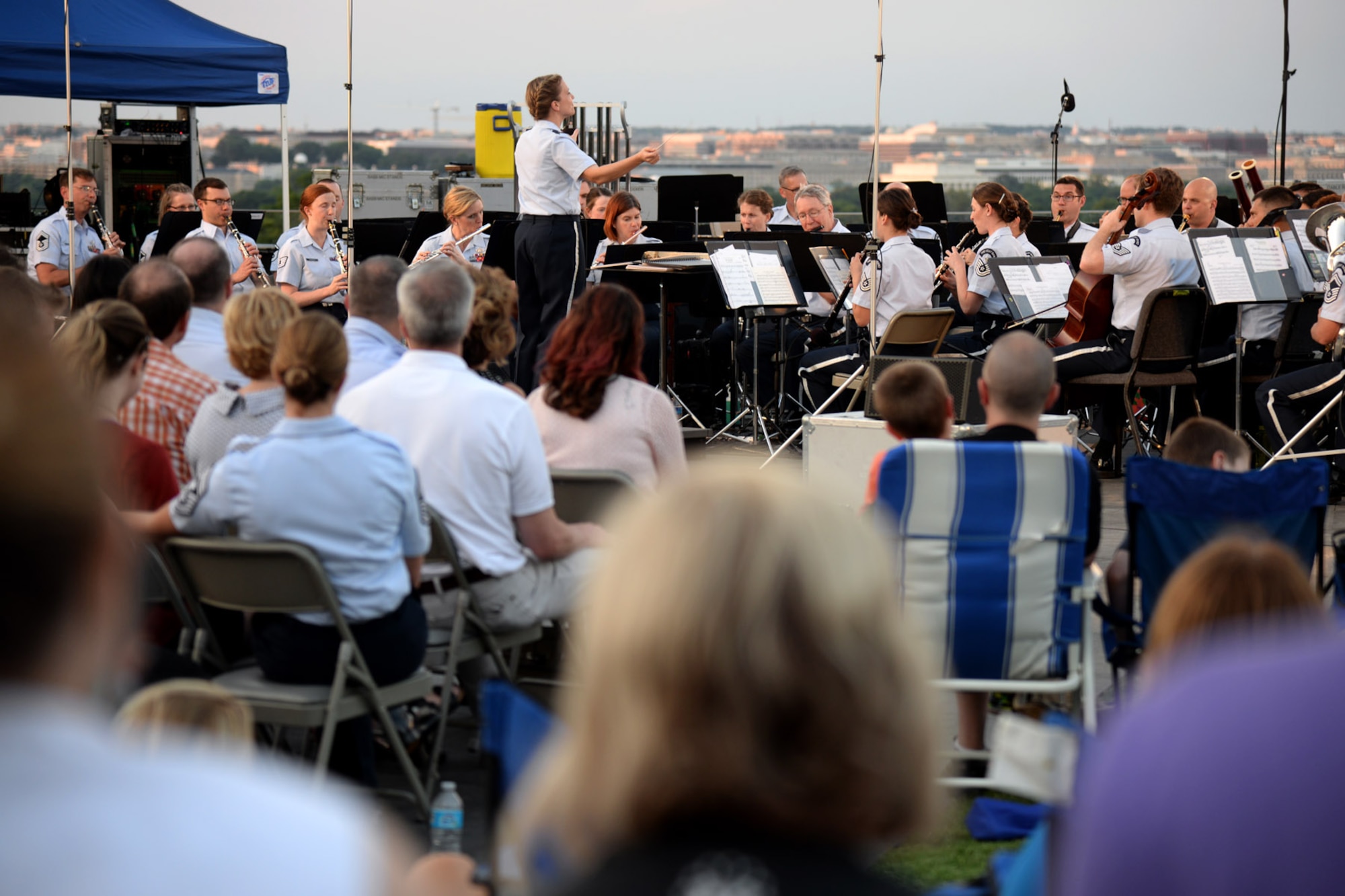 The U.S. Air Force Band performs for an audience at the Air Force Memorial in Arlington, Va., June 17, 2016. During the performance, the Macy’s Band Selection Committee announced the United States Air Force Band and Honor Guard will represent the Air Force and perform in New York City in the 2017 Macy’s Thanksgiving Day Parade. (U.S. Air Force photo/Tech. Sgt. Matt Davis)