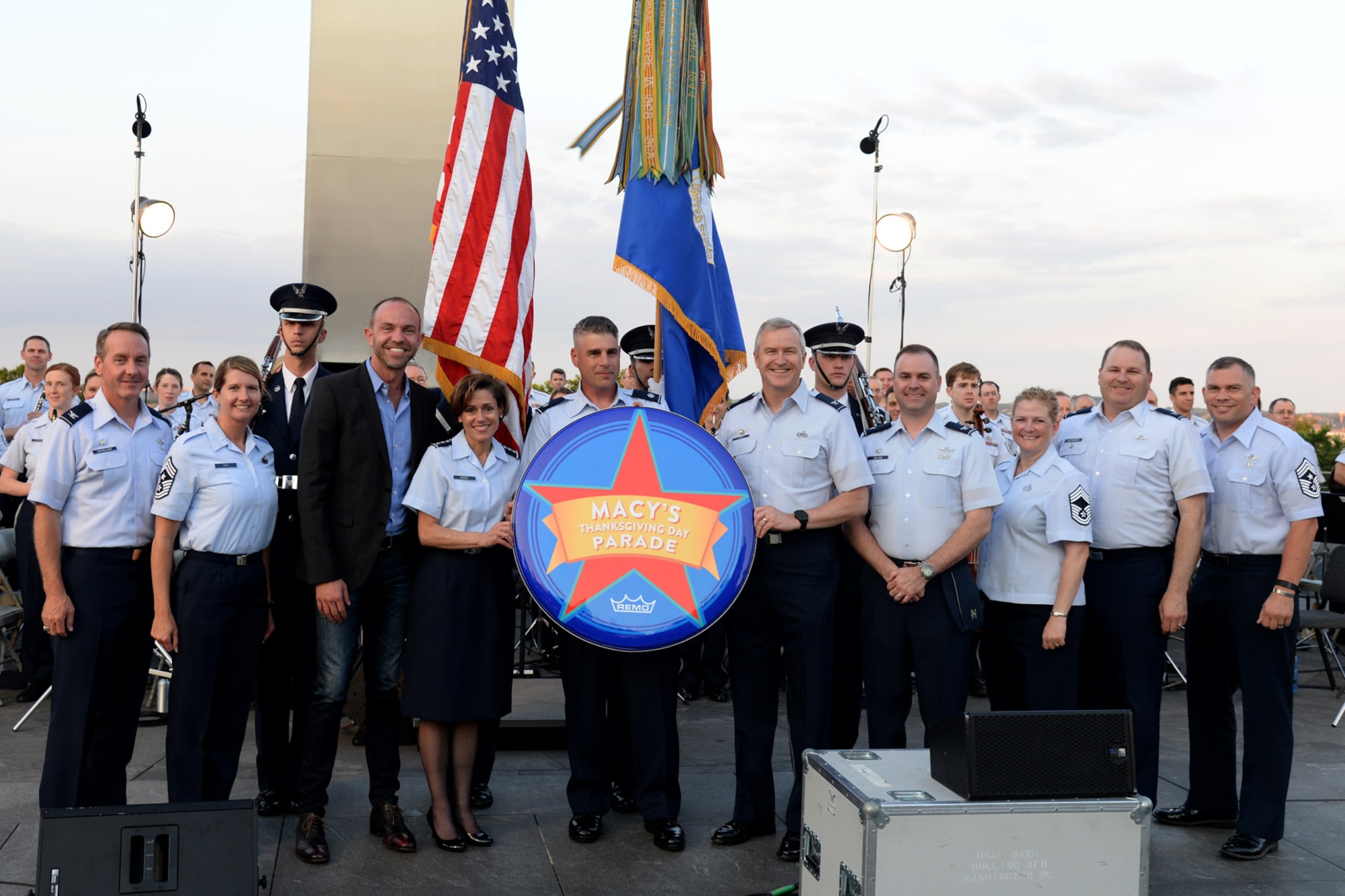 Lt. Gen. Gina M. Grosso, Deputy Chief of Staff for Manpower, Personnel and Services, Headquarters U.S. Air Force, accepts the Macy’s Day Parade drum head with Band and Honor Guard leadership at the Air Force Memorial in Arlington, Va., June 17, 2016. During the performance, the Macy’s Band Selection Committee announced the United States Air Force Band and Honor Guard will represent the Air Force and perform in New York City in the 2017 Macy’s Thanksgiving Day Parade. (U.S. Air Force photo/Tech. Sgt. Matt Davis)