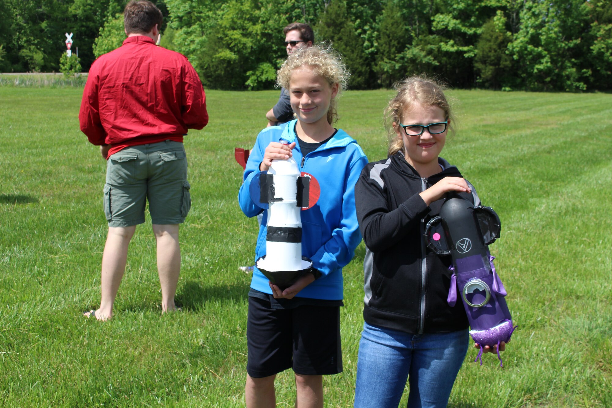 Abigail Vorhees-Fontenot, right, was the winner of the matchhead rocket competition at Rocketday!, an event held at the Hands on Science Center in Tullahoma on May 14. Rocketday! was organized as a learning opportunity for area youth by the AIAA Tennessee Section. Pictured is Abigail with her brother Caleb with their Two-Cool competition entries. (Courtesy photo/Tanya Sheeley)