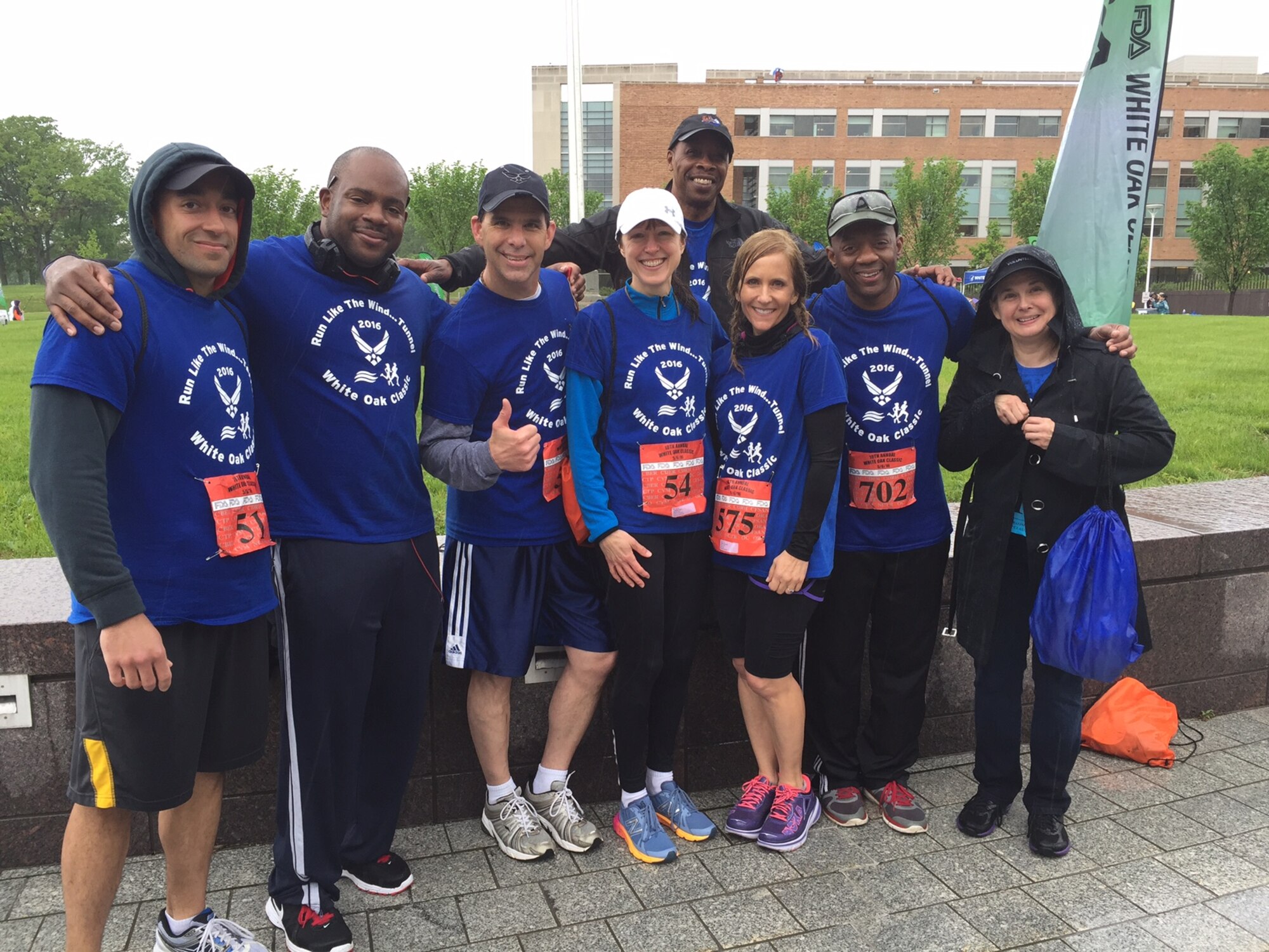 Hypervelocity Wind Tunnel 9 team members pause for a photo after their participation in the 10th Annual White Oak Classic 5K Run and 2.5 Mile Health Walk at the Food and Drug Administration White Oak Building, White Oak, Md., May 5, 2016. The event was designed to promote health lifestyle activities and interaction among staff located at the FDA building where Tunnel 9 staff are tenants. Pictured left to right is Jonathan Brooks, Taurean Gray, Dan Marren, Kristi Marren, Arnold Collier, Christine Ewing, Robert Mitchell and Susan Drinnon. (Courtesy photo)