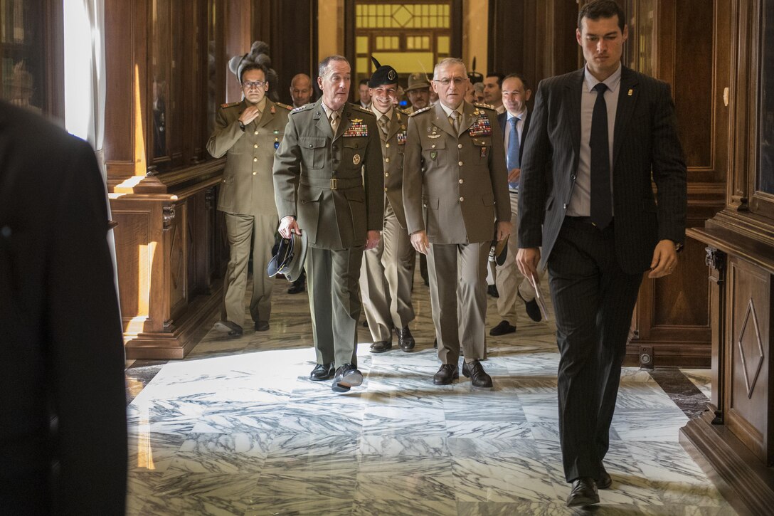 Marine Corps Gen. Joe Dunford, chairman of the Joint Chiefs of Staff, meets with Gen. Claudio Graziano, chief of defense for Italy's armed forces, at a conference for defense chiefs at Palazzo Esercito, Rome, June 20, 2016. During the conference, Dunford met with his counterparts from 10 countries. DoD Photo by Navy Petty Officer 2nd Class Dominique A. Pineiro