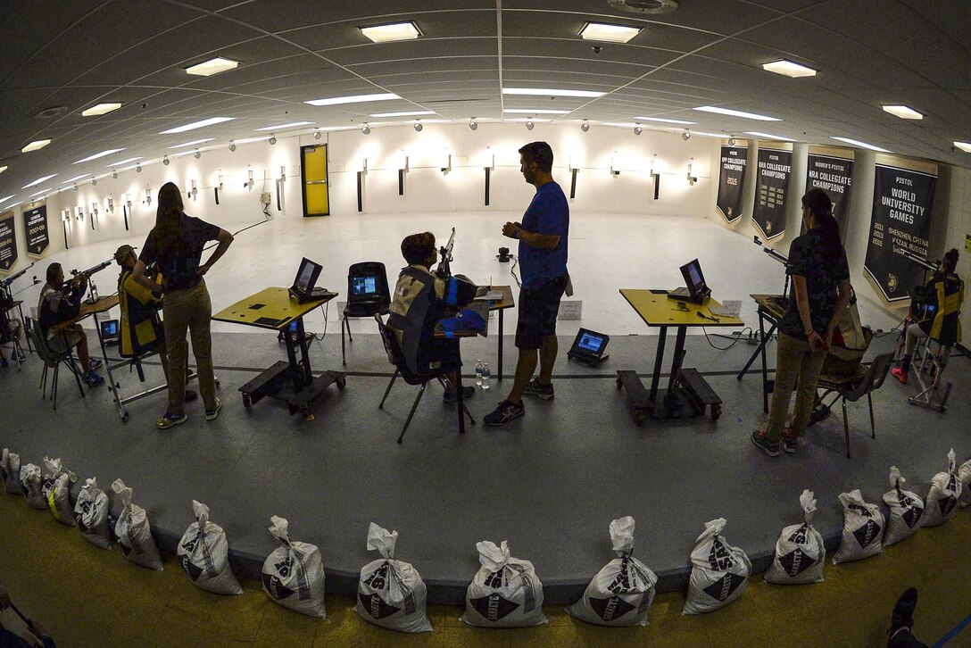 Athletes compete with air rifles in a shooting competition during the 2016 Department of Defense Warrior Games at the U.S. Military Academy in West Point, N.Y., June 19, 2016. DoD photo by EJ Hersom