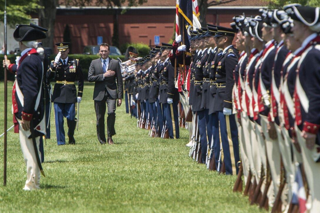 Army Secretary Eric Fanning inspects soldiers during a welcome ceremony for him on Joint Base Myer-Henderson Hall in Arlington, Va., June 20, 2016. Defense Secretary Ash Carter provided remarks during the event. DoD photo by Navy Petty Officer 1st Class Tim D. Godbee