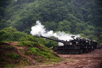 U.S. Army Soldiers in the 1st Battalion “Dragons,” 82nd Field Artillery Regiment, 1st Armored Brigade Combat Team, 1st Cavalry Division, coordinate fires May 10 with South Korean artillery batteries from the 26th Mechanized Infantry Division Artillery. The exercise, less than six miles from the Demilitarized Zone that separates North and South Korea, involved 30 self-propelled artillery from the U.S. and South Korea. (U.S. Army photo by Staff Sgt. Keith Anderson, 1st Armored Brigade Combat Team Public Affairs, 1st Cav. Div.)
