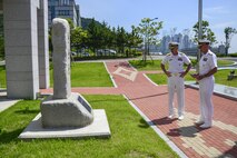 160617-N-SR567-027 BUSAN, Republic of Korea (June 17, 2016) Adm. Scott Swift, the commander of U.S. Pacific Fleet, and Rear Adm. Bill Byrne, commander, U.S. Naval Forces Korea (CNFK), read a memorial honoring the Republic of Korea (ROK) ship Cheonan during a visit to CNFK Headquarters. During his visit to the ROK, Swift will meet with U.S. and ROK military and civilian leaders, and visit with Sailors serving throughout the peninsula. (U.S. Navy photo by Mass Communication Specialist 3rd Class Wesley J. Breedlove/Released)