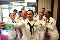 160617-N-WT427-111 JINHAE, Republic of Korea (June 17, 2016) Master-at-Arms Seaman Apprentice Elysia Clark, assigned to Commander, Fleet Activities Chinhae (CFAC), takes a selfie with Adm. Scott H. Swift, the commander of U.S. Pacific Fleet, during his visit to CFAC in the Republic of Korea, June 17, 2016. Swift is in Korea to reaffirm the U.S. and ROK alliance and show his support for Sailors serving throughout the peninsula. (U.S. Navy photo by Mass Communication Specialist 3rd Class Jermaine M. Ralliford)