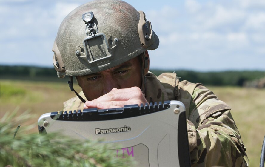 A U.S. Air Force tactical air control party Airmen from the 4th Air Support Operations Group coordinates a live-fire event during exercise Anakonda 2016 June 16, 2016, in Poland. The event was an opportunity for U.S. Airmen to train alongside allies and test aircraft, vehicles and other equipment in a live-fire exercise. The event served as a wrap up for Anakonda 2016, a Polish-led international exercise that aimed to train, exercise and integrate Poland and its allied forces by demonstrating their defense capabilities to deploy in mass numbers and sustain combat power. (U.S. Air Force photo/Airman 1st Class Lane T. Plummer)