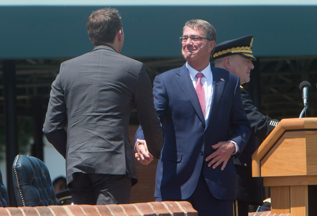 Defense Secretary Ash Carter congratulates Army Secretary Eric Fanning during his welcome ceremony at Joint Base Myer-Henderson Hall,, Va., June 20, 2016. DoD photo by Navy Petty Officer 1st Class Tim D. Godbee
