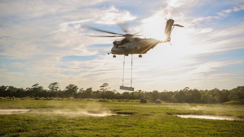 A CH-53E Super Stallion carries an external load during a training exercise at Landing Zone Albatross on Marine Corps Base Camp Lejeune, N.C., June 9, 2016. The purpose of external lifts is to transport large amounts of supplies and heavy gear into areas inaccessible by ground vehicles. 