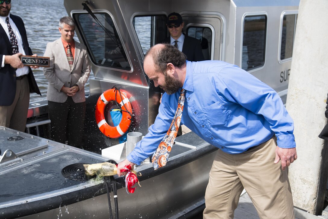 The Charleston District christened its newest survey vessel, the SV Heiselman, with a ceremony to honor her namesake, former employee Gene Heiselman. The Heiselman family was there for the festivities and Heiselman's son christened the boat with a bottle of champagne.