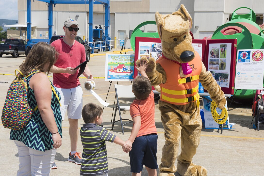 Bobber the Water Safety Dog appeared at Coast Guard Sector Charleston's National Safe Boating Week kickoff event, where he spread the word to children about wearing their life jackets.