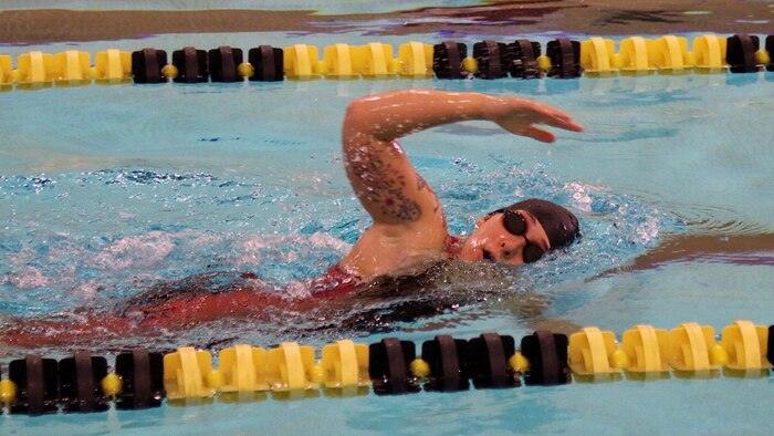 U.S. Marine Corps veteran Jenna Bisone of Oceanside, California, competes in the swimming competition during the 2016 Department of Defense Warrior Games at the U.S. Military Academy at West Point, New York, June 20, 2016. She earned a gold medal in the 59-meter mixed freestyle event.