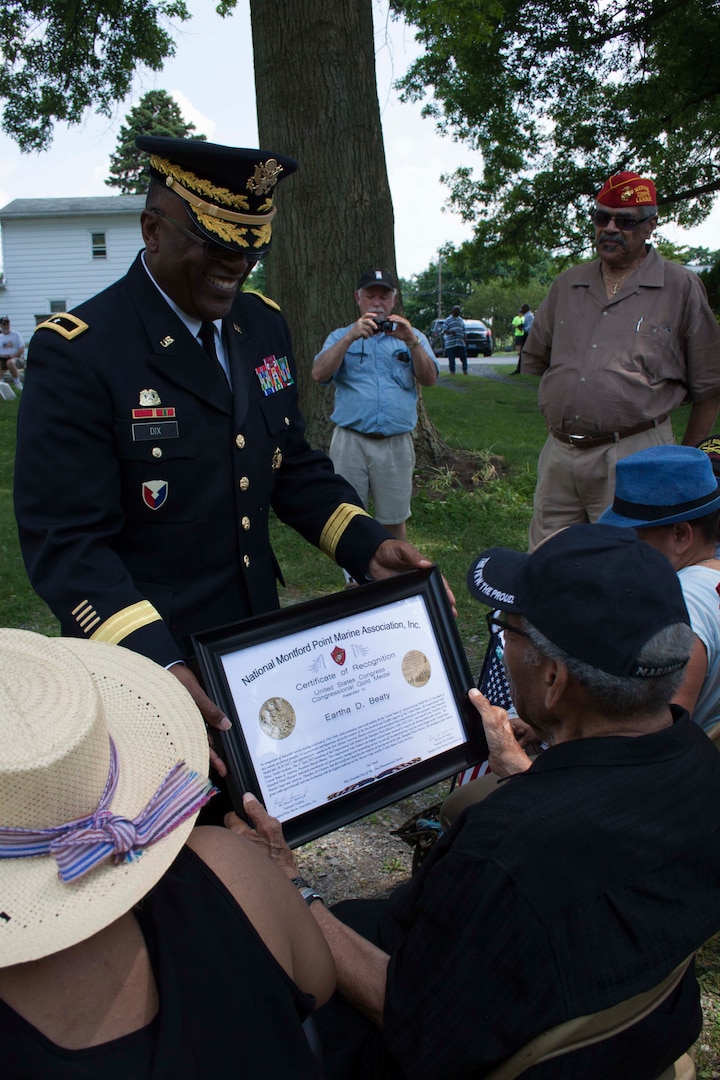 Dix recognized Eartha Beaty, a 90-year-old Montford Point Marine, one of the first African Americans to serve in the United States Marine Corps, with a Certificate of Appreciation from the Montford Point Marine Association.