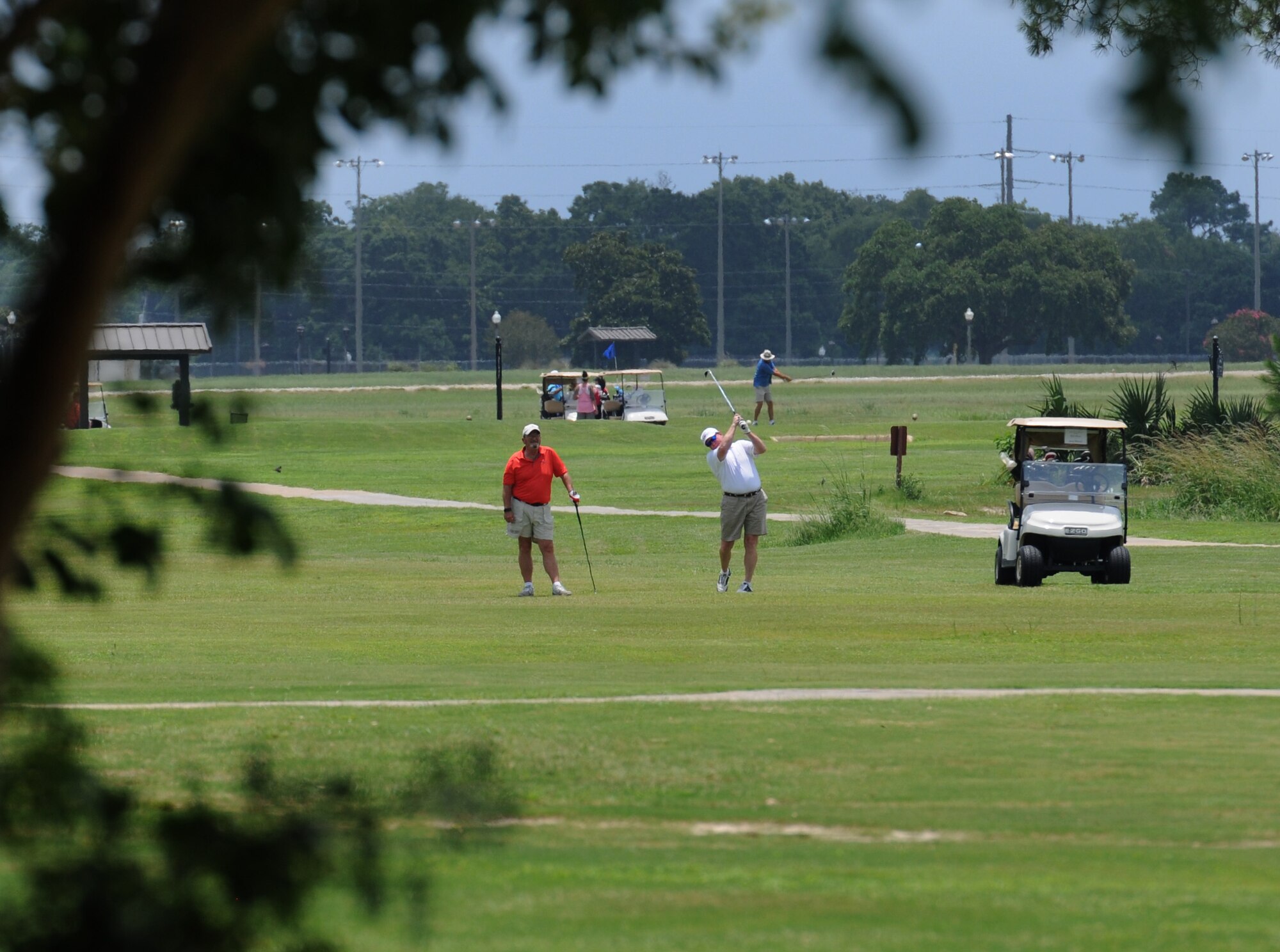 Retired Brig. Gen. Richard Moss and Jerry Munro, Biloxi Bay Chamber of Commerce board members, participate in the Don Wylie Memorial Golf Tournament at the Bay Breeze Golf Course June 17, 2016, Keesler Air Force Base, Miss. The annual tournament raised funds to help the Military & Veterans Affairs committee honor military members. (U.S. Air Force photo by Kemberly Groue)