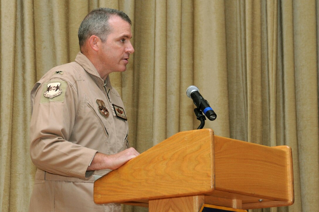 Col. Charles Bolton, 386th Air Expeditionary Wing commander, addresses the Marauders of the 386 AEW after taking command at an undisclosed location in Southwest Asia, June 20, 2016. Bolton returns to the 386 AEW after serving as the 386th Expeditionary Operations Support Squadron commander from June 2009 to 2010. (U.S. Air Force photo by Senior Airman Zachary Kee)