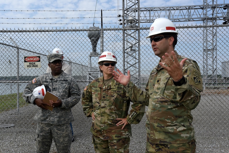 (Lt. Col. Stephen  Murphy (Right), U.S. Army Corps of Engineers Nashville District commander, briefs soldiers from the Tennessee National Guard as a security assistance exercise kicks off to protect the Old Hickory Dam Powerhouse and Switchyard in Hendersonville, Tenn., June 20, 2016.
