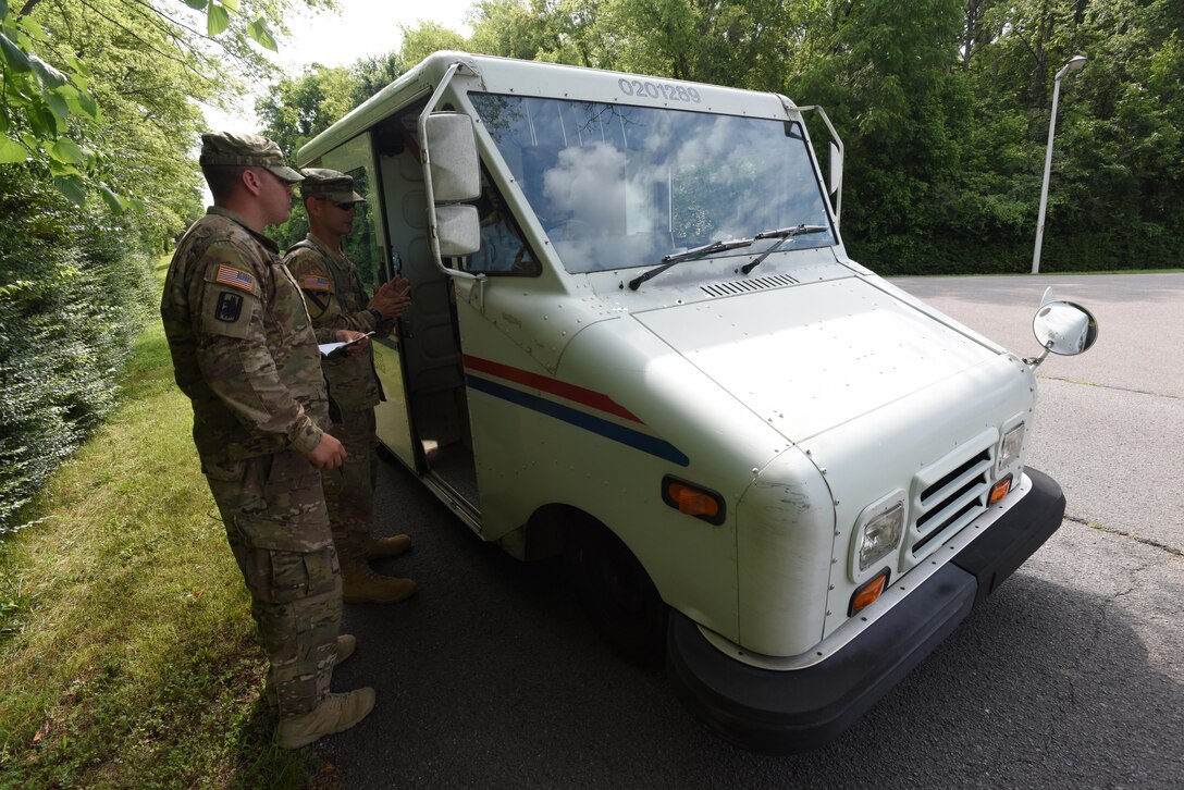 Soldiers with the Tennessee National Guard’s 269th Military Police Company, 117th Military Police Battalion, 194th Engineer Brigade, clear a U.S. Postal Service worker delivering mail to the Corps of Engineers during a security assistance exercise kicks off to protect the Old Hickory Dam Powerhouse and Switchyard in Hendersonville, Tenn., June 20, 2016.