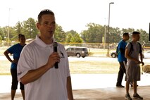 U.S. Air Force Col. Charles E. Brown Jr., commander, 19th Airlift Wing, announces that “lunch is served,” during a break in competition at Team Little Rock’s annual sports day at Little Rock Air Force Base, Ark., June 17, 2016. Servicemembers from the 19th Airlift Wing, 314th Airlift Wing, 913th Airlift Group and the Arkansas Air National Guard’s 189th Airlift Wing, participated in the day-long event as they competed for the commander’s cup and bragging rights. (U.S. Air Force photo by Master Sgt. Jeff Walston/Released)