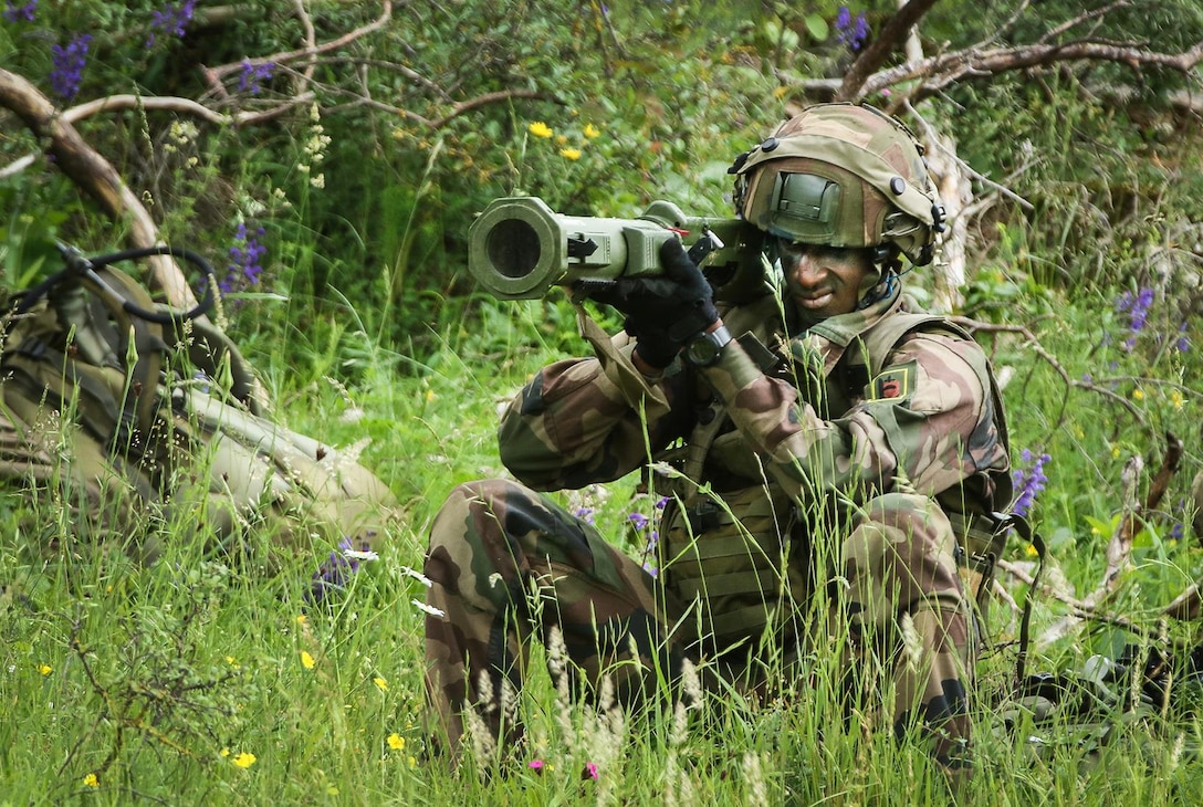 A French paratrooper aims his anti-tank weapon at a role-playing enemy tank after participating in an airborne operation during Swift Response 16 in Hohenfels, Germany, June 15, 2016. Army photo by Sgt. Juan F. Jimenez
