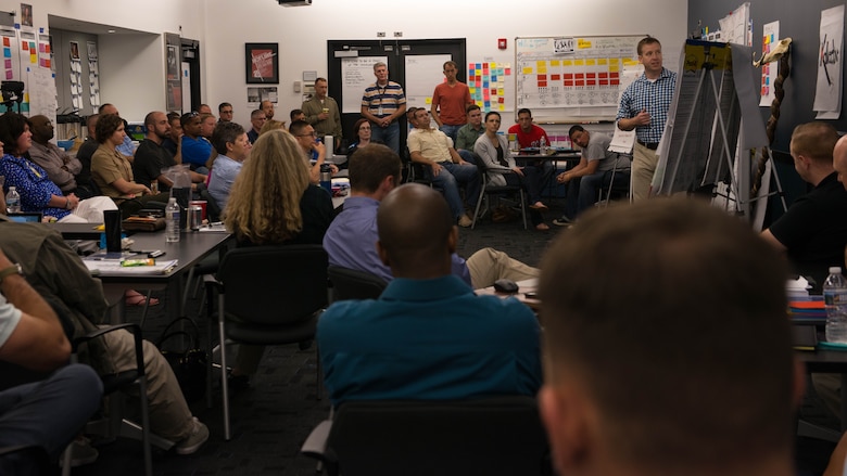 Several dozen Marines, from all across the Marine Corps, discuss ideas that will help improve the intelligence community in Stafford, Virginia, June 17, 2016. Marines of different ranks spent five days, in five different teams and came up with solutions to problems they had encountered in the intelligence field. 