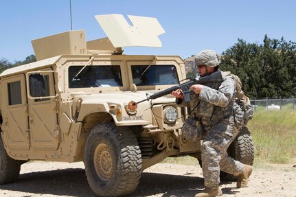 U.S. Army Reserve Sgt. Paul Dowd, Medic, 445th Civil Affairs Battalion, Mountain View, Calif., takescover from direct fire at a senior leader engagement scenario during Combat Support Training Exercise91-16-02, Fort Hunter Liggett, Calif., June 16, 2016. As the largest U.S. Army Reserve trainingexercise, CSTX 91-16-02 provides Soldiers with unique opportunities to sharpen their technical andtactical skills in combat-like conditions. (U.S. Army photo by Spc. Fatima Konteh, 367th MobilePublic Affairs Detachment)