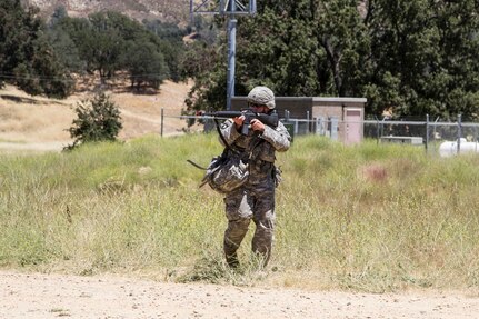 U.S. Army Reserve Sgt. Paul Dowd, Medic, 445TH Civil Affairs Battalion, Mountain View, Calif.,reacts to an attack from opposing forces while participating in a senior leader engagement scenarioduring Combat Support Training Exercise 91-16-02, Fort Hunter Liggett, Calif., June 16, 2016. As thelargest U.S. Army Reserve training exercise, CSTX 91-16-02 provides Soldiers with uniqueopportunities to sharpen their technical and tactical skills in combat-like conditions. (U.S. Army photoby Spc. Fatima Konteh, 367th Mobile Public Affairs Detachment)