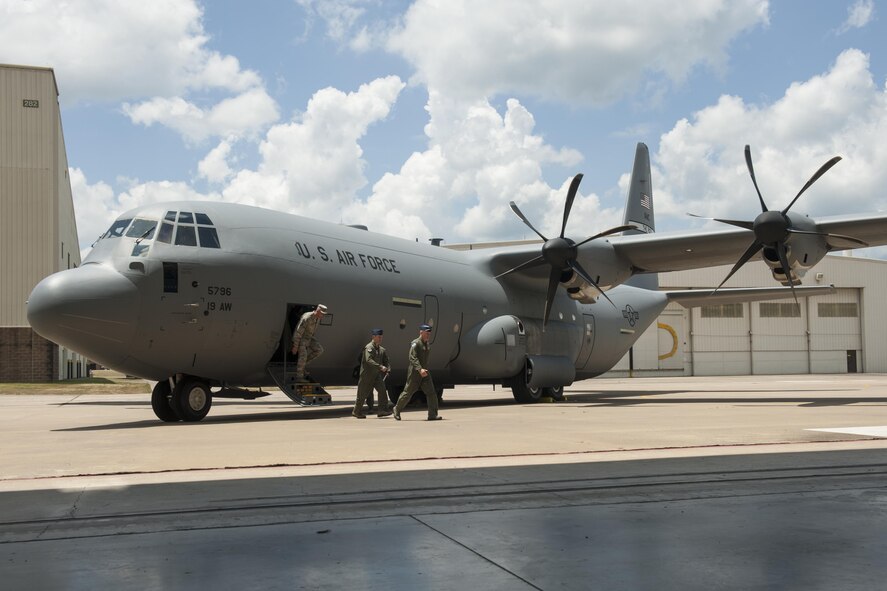 U.S. Air Force Gen. Carlton D. Everhart II, Air Mobility Command commander, departs a C-130J prior to an aircraft delivery ceremony at Little Rock Air Force Base, Ark., June 20, 2016. Everhart delivered the final C-130J to the 19th Airlift Wing form Lockheed Martin. (U.S. Air Force photo/Senior Airman Harry Brexel)