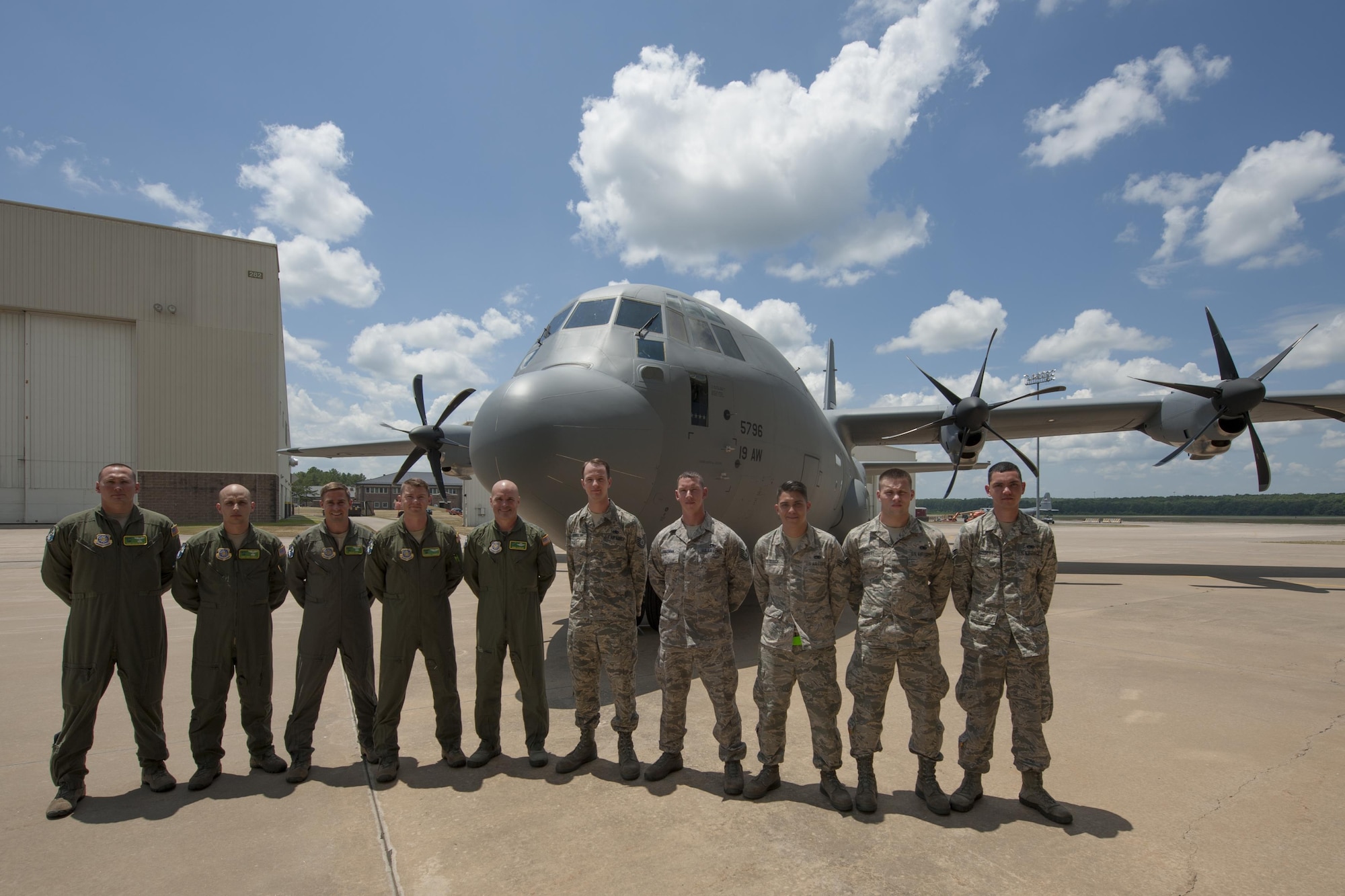 U.S. Air Force Gen. Carlton D. Everhart II, Air Mobility Command commander, center, stands with a crew of Airmen who delivered a C-130J to the 19th Airlift Wing at Little Rock Air Force Base, Ark., June 20, 2016. The aircraft was the final C-130J to be delivered from Lockheed Martine and marks the end of an airframe transition that lasted more than a decade at Little Rock AFB.  (U.S. Air Force photo/Senior Airman Harry Brexel)