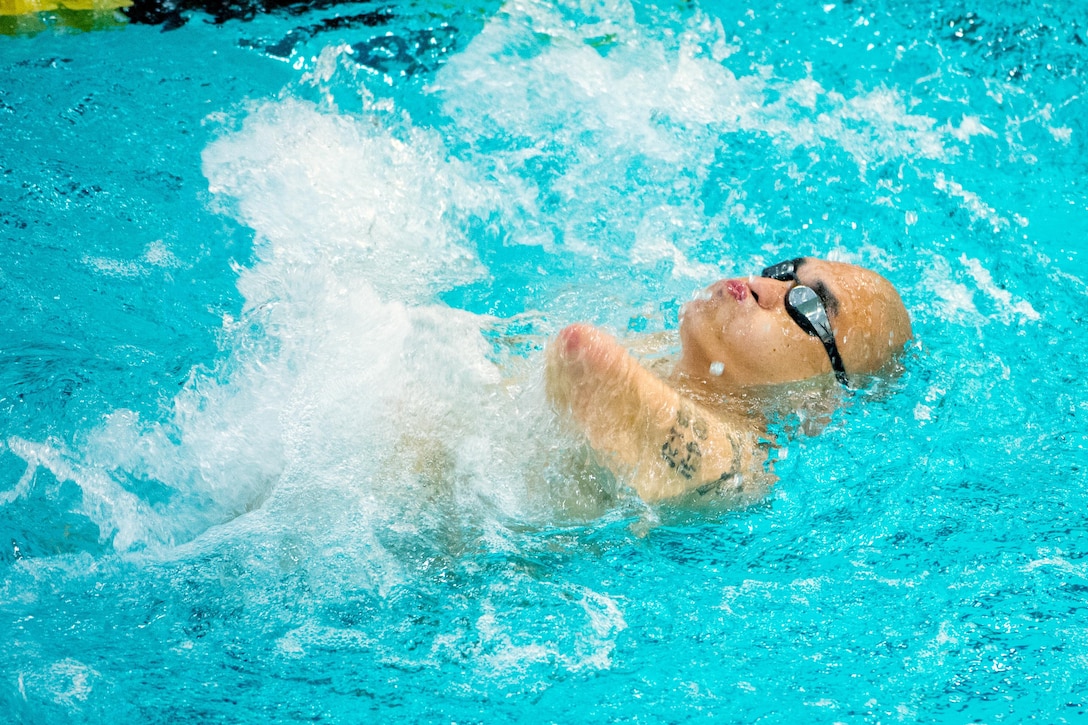 Army veteran Matthew Lammers competes in a backstroke event during the 2016 Department of Defense Warrior Games at the U.S. Military Academy in West Point, N.Y., June 20, 2016. DoD photo by EJ Hersom