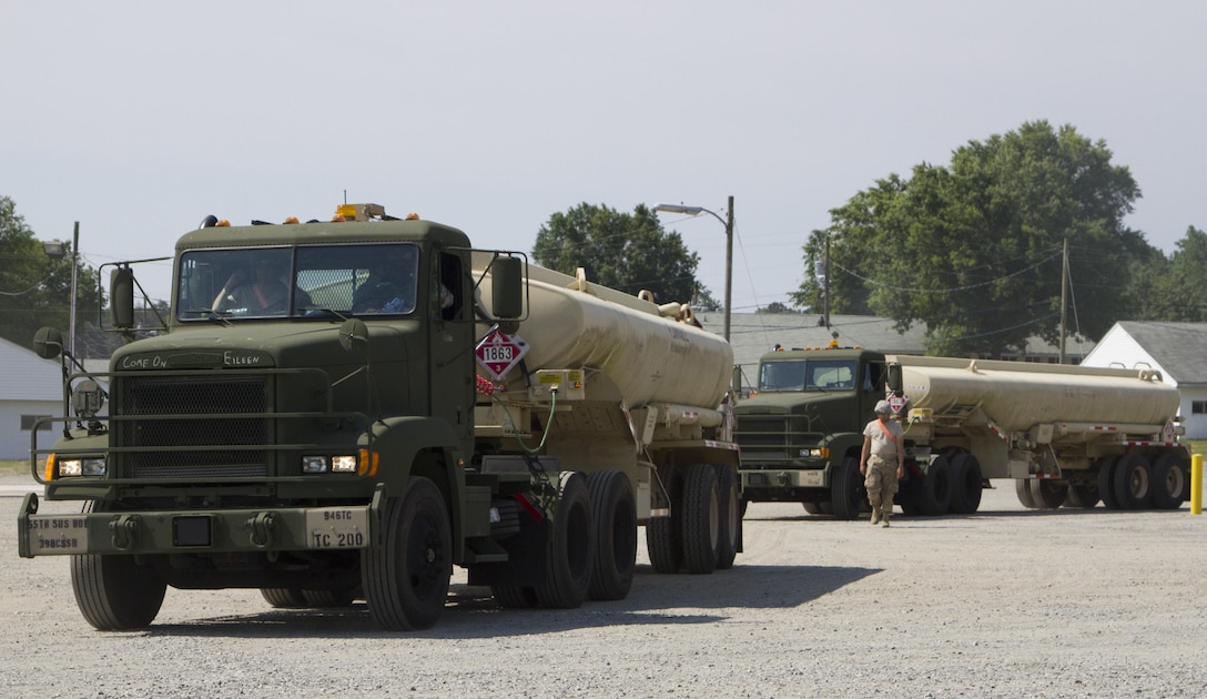 Fort A.P. Hill, Va. — Soldiers from the 946th Transportation Company begin staging trucks for their mission at the Quartermaster Liquid Logistics Exercise 2016. The transportation company will be driving 5,000 gallon tanker trucks of fuel to outlying areas. (U.S. Army photo by Sgt. James Bradford, 372nd Mobile Public Affairs Detachment)