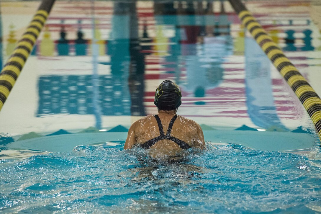 Army Capt. Kelly Elmlinger competes in a breaststroke event during the 2016 Department of Defense Warrior Games at the U.S. Military Academy in West Point, N.Y., June 20, 2016. DoD photo by Roger Wollenberg