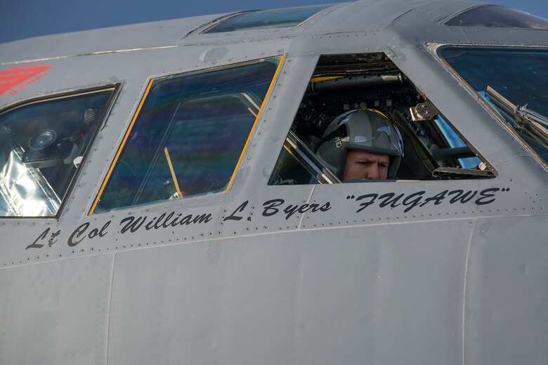 U.S. Air Force Lt. Col. Erik Johnson, 340th Weapons School (WPS) commander, readies for a mission in the cockpit of a B-52H Stratofortress on June 8, 2016, Nellis Air Force Base, Nev. The mission of the 340th WPS is an extension of the mission of the U.S. Air Force Weapons School, which is to provide graduate level instructor courses that provide the world’s most advanced training in weapons and tactics employment to Air Force officers. (U.S. Air Force photo by Master Sgt. Greg Steele/Released)