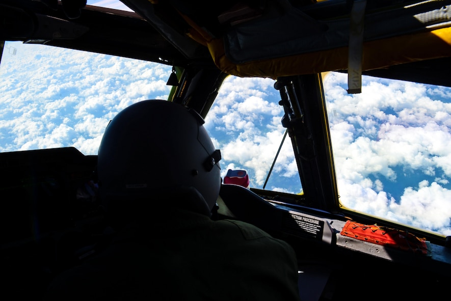 Lt. Col. Wade Karren, 11th Bomb Squadron commander, observes a target during a simulated bomb drop June 15, 2016. The B-52 Stratofortress has been in service for over 60 years. Its long range and heavy payload ability makes it an essential asset even today. (U.S. Air Force photo/Senior Airman Luke Hill)