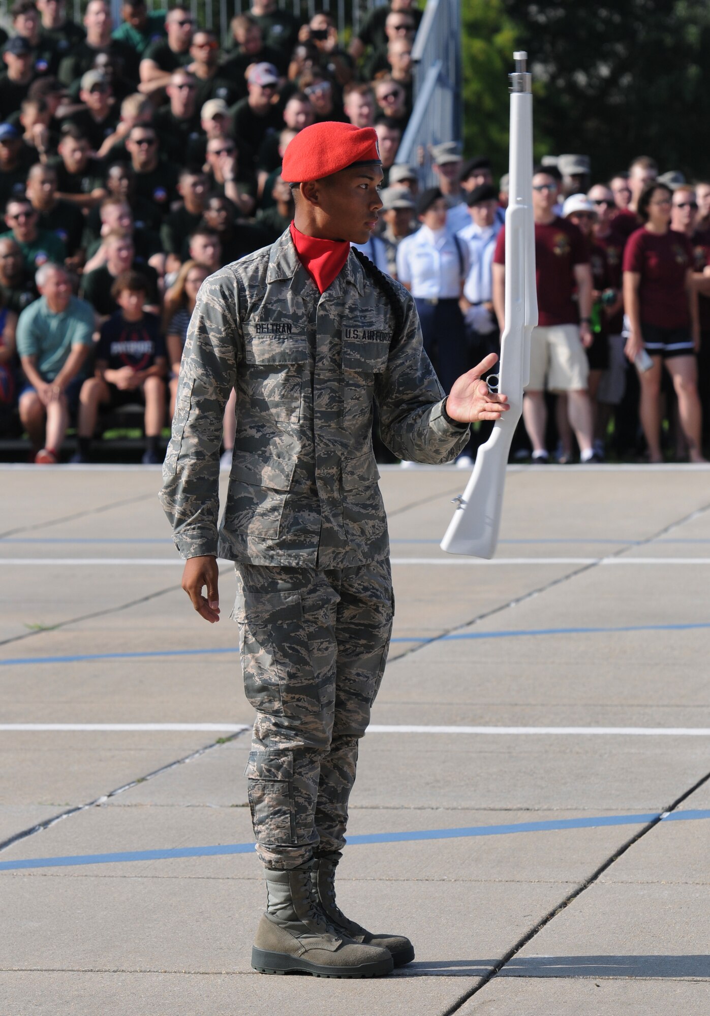 Airman Basic Mark Beltran, 336th Training Squadron freestyle drill team member, spins a rifle during the 81st Training Group drill down at the Levitow Training Support Facility drill pad June 17, 2016, Keesler Air Force Base, Miss. The 336th TRS “Red Wolves” placed second in freestyle. (U.S. Air Force photo by Kemberly Groue)