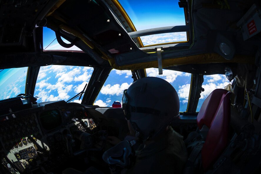 Lt. Col. Wade Karren, 11th Bomb Squadron commander, copilots a B-52 Stratofortress during a simulated bomb drop June 15, 2016. The bomb drop was part of a B-52 and B-1 Lancer integration flight fostering teamwork between bomber pilots of different aircraft. (U.S. Air Force photo/Senior Airman Luke Hill)