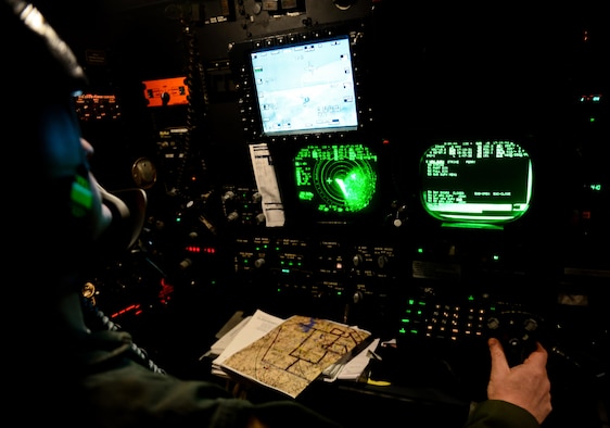 Maj. John Mullins, 11th Bomb Squadron combat systems officer, aims at a target during a B-52 Startofortress and B-1 Lancer integration flight June 15, 2016. Combat systems officers employ a wide range of high-tech equipment and weaponry to deliver unmatched power and mobility to successfully accomplish their missions. (U.S. Air Force photo/Senior Airman Luke Hill)