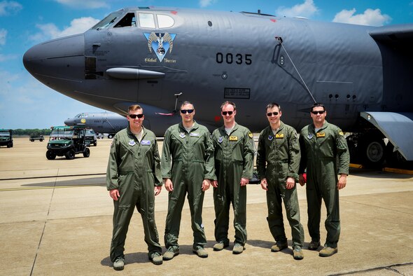 A B-52 stratofortress crew poses for a photo after a B-52 and B-1 Lancer integration flight at Barksdale Air Force Base, La., June 15, 2016. Capt. Dane Kidman, far left, a B-1 Lancer navigator from Dyess Air Force Base, Texas, joined the B-52 crew from Barksdale for the flight. The intent of the flight was not only for training, but also to further create a bomber culture under Air Force Global Strike Command. (U.S. Air Force photo/Senior Airman Luke Hill)