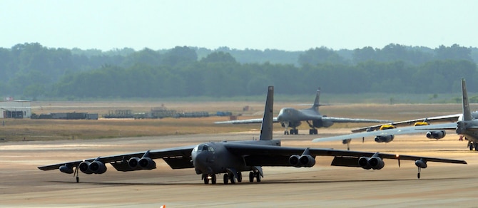 A B-52 Stratofortress and a B-1 Lancer taxi to the runway at Barksdale Air Force Base, La., June 15, 2016. The two bombers took part in an inaugural integration flight where a B-1 aviator acted as mission commander and crewmember aboard the B-52. (U.S. Air Force photo/Senior Airman Curt Beach)