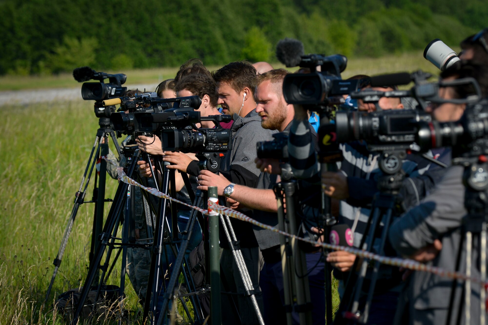 Local reporters watch an A-10C Thunderbolt II land on a highway June 21, 2016, in Tallinn, Estonia.  U.S. forces are in Europe participating in Saber Strike 16; a long-standing, U.S. Joint Chiefs of Staff-directed, U.S. Army Europe-led cooperative-training exercise, which has been conducted annually since 2010. This year’s exercise will focus on promoting interoperability with allies and regional partners. The United States has enduring interests in supporting peace and prosperity in Europe and bolstering the strength and vitality of NATO, which is critical to global security. (U.S. Air Force photo/Senior Airman Nicole Keim)