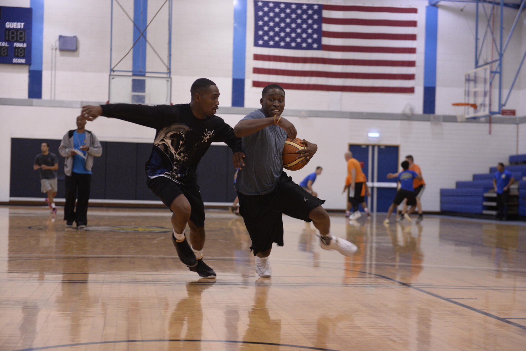Airmen from the 48th Mission Support Group play basketball during the second annual 48th Mission Support Group Olympics at Royal Air Force Lakenheath, England, June 16, 2016. Nine contests ranging from basketball and dodgeball, to sumo wrestling and a relay race, were set up pitting squadrons against each other for a chance to win the coveted 48th MSG title belt. (U.S. Air Force photo/ Airman 1st Class Abby L. Finkel)